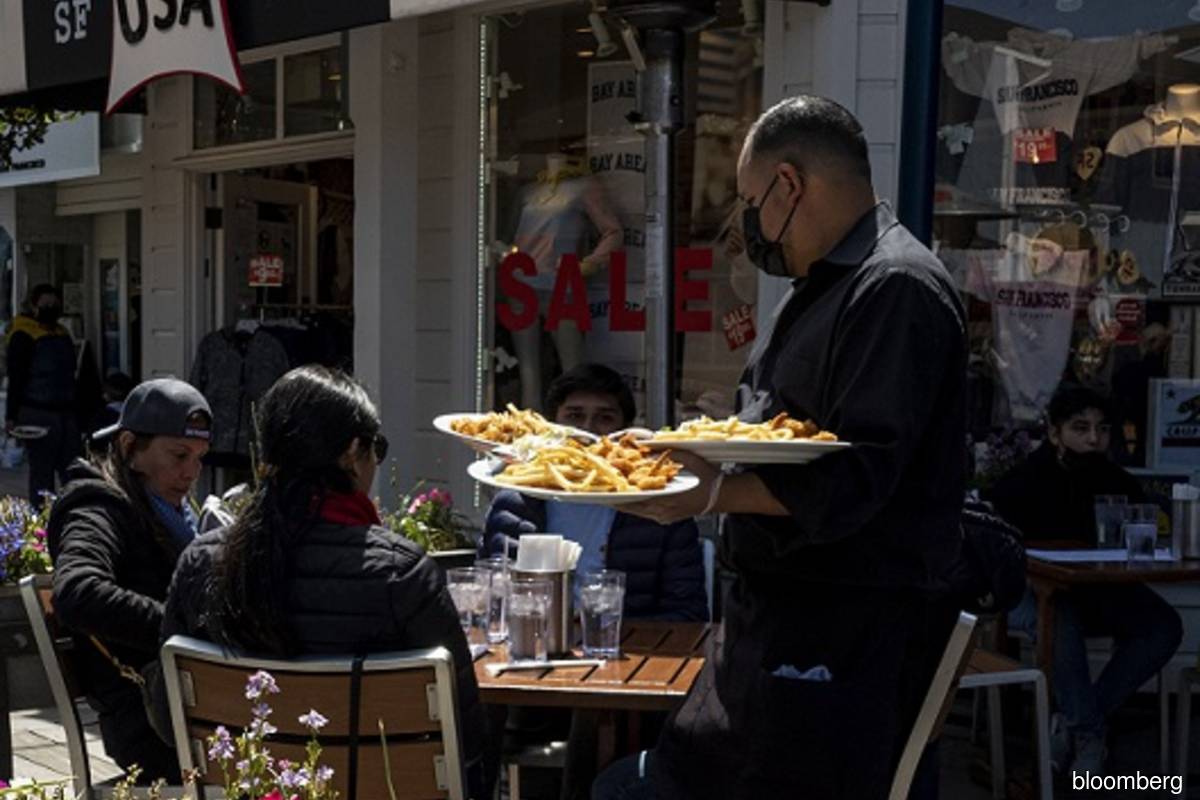 US jobless claims fall more than forecast to pandemic low